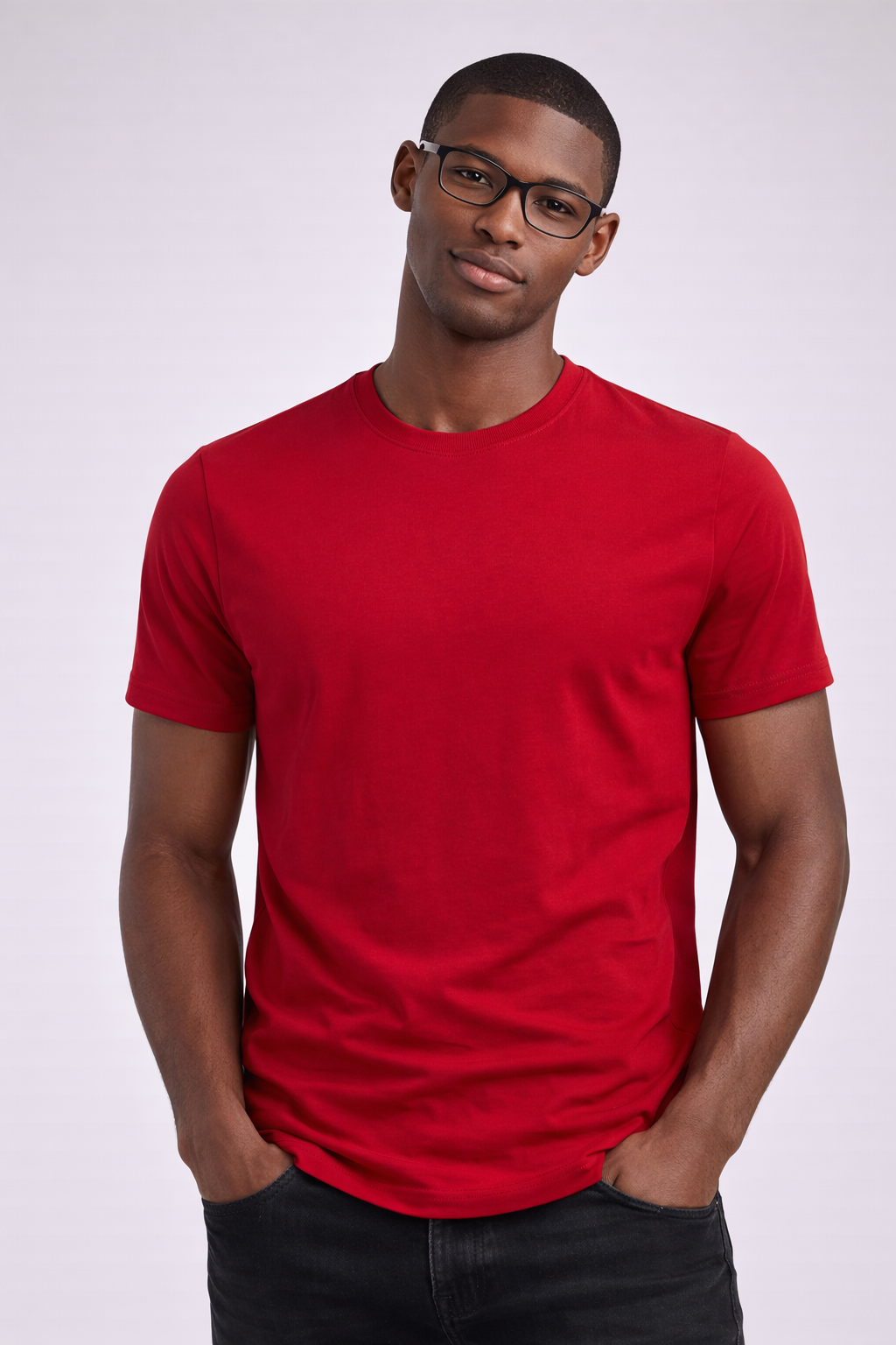 Man wearing a red t-shirt and glasses against a white background
